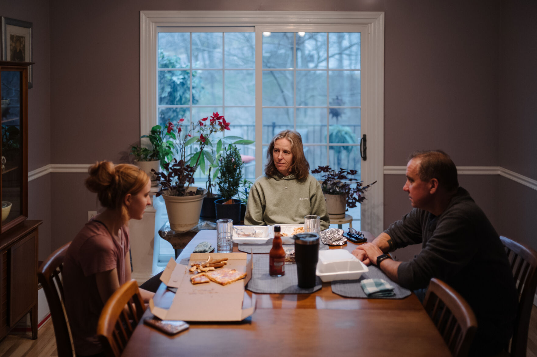 Cora Windmoeller, and her parents Michelle and Steve have a conversation